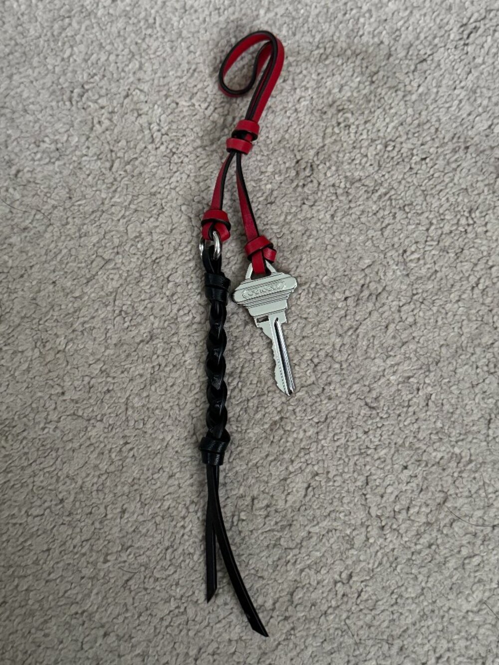 Coach leather bag charm with key, NWOT (comes from Venturer 27 bag)